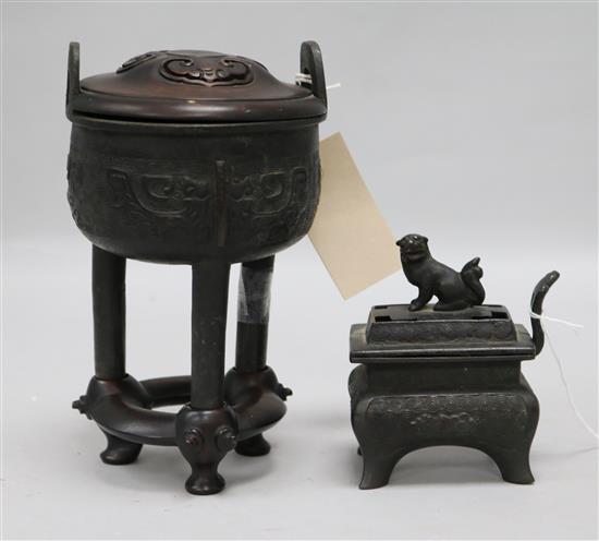 Two Chinese small bronze censers, one with carved pierced hardwood cover and stand, one rectangular with lion dog finial (faults)